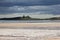 Dunstanburgh Castle with stormy skies 1