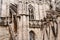 Duomo marble facade with arched windows. Italy, Milan