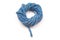 Durable colored rope for climbing equipment on a white background. coil of braided cable. item for tourism and travel
