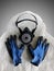 Durable respirator and gloves on a raincoat