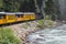 The Durango and Silverton Narrow Gauge Railroad Steam Engine travels along Animas River, Colorado, USA