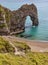 Durdle Door - the empty shingle beach at Durdle Door on the Jurassic Coast of Dorset, United Kingdom