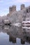 Durham Cathedral & Mill across the River Wear in the snow in Durham, England, UK