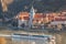 Durnstein village during spring time with tourist ship on Danube river in Wachau (UNESCO), Austria