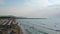 Durres, Albania - August 24, 2023: tourists bathing in Adriatic Sea shore in Qerret sandy beach.