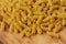 Durum macaroni on a wooden table macro