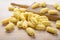 Durum wheat gnocchi and gnocchi board. Ingredients: durum wheat semolina, water, salt. Close-up