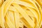 Durum wheat semolina pasta fettuccine close up