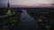 Dusk aerial approaching Tower Bridge Following the River Thames toward the London Eye