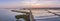 Dusk aerial panoramic seascape view of Olhao salt marsh Inlet.