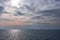 Dusk colors on a cloudy sky over the sea in Thessaloniki, Greece