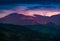 Dusk mountain landscape. Rodnei Mountains in dramatic light.