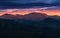 Dusk mountain landscape. Rodnei Mountains in dramatic light.