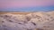 Dusk over badlands and  prairie in Colorado