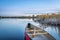 Dusk over calm lake with a canoe