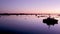 Dusk in Quatro-Aguas Recreational Port and ferry boat pier. Algarve, Portugal.