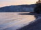 Dusk Reflections on Rocky Beach, Greece