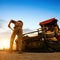 Dusk, road workers are working.