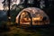 Dusk settles over a geodesic glamping dome nestled in a forest clearing, a cozy sanctuary amid nature. Camping with