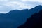 Dusk shot of hills covered with fog and clouds shot at McLeodganj dharamshala India