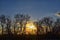 Dusk Sunset views through winter tree branches by Opryland along the Shelby Bottoms Greenway and Natural Area Cumberland River, Na