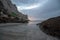 Dusk Twilight Sunset reflections at Morro Rock on the central coast of California at Morro Bay California USA