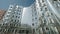 DUSSELDORF, GERMANY - 1 July 2021: Famous shiny metal building of Neuer Zollhof in Media Harbor Medienhafen, designed by