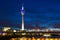 Dusseldorf night scene includes media tower and bridge on Rhine river