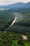 Dust road through green jungle at Vietnam