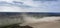 Dust storm on an agricultural field. Drone view