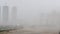 Dust storm over the city .Dust pollution from desert. Urbanization. Concept of air pollution