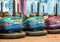 Dusty colored electric bumper cars or dodgem cars parked
