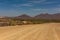 The dusty gravel road along the Kunene River in northern Namibia