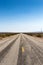 dusty highway route 66 leads through the mojave desert, California, USA