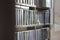 Dusty old bookshelf with cobwebs and books