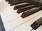 Dusty piano keyboard