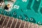 dusty printed circuit Board with components . macro selective focus