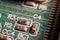dusty printed circuit Board with components . macro selective focus