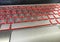 Dusty, static dust covered modern laptop gaming keyboard with red led backlight