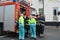 Dutch ambulance and fireman standing next to Carnaval parade