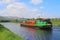 Dutch barge cruising Scottish canal