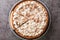 Dutch and Belgian Rice cake tart with whipped cream and chocolate chips close-up in a plate. Horizontal top view