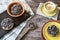 Dutch breakfast with rusk and chocolate hail, flakes and yellow mug of coffee