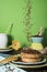 Dutch breakfast with rusk and chocolate hail hagelslag, against green background