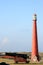 Dutch canon and lighthouse near Huisduinen