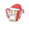 Dutch cheese Cartoon character in Santa costume with candy