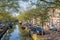 Dutch city Enkhuizen with cars parked along a canal