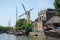 Dutch cityscape Gouda with canal-windmill-ships