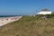 Dutch coast with seaside visitors relaxing at the beach