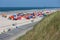 Dutch coast with seaside visitors relaxing at the beach